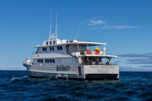 This is a photo of the Galaxy Diver liveaboard out on the water where you can see the dive deck